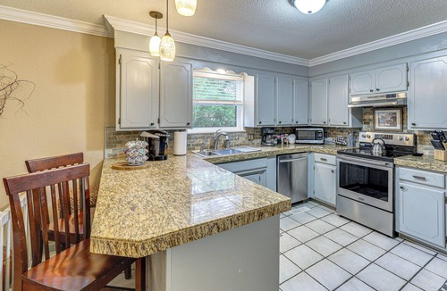 Rockwell House | Sunroom & Yard: Charming Hot Springs Home!