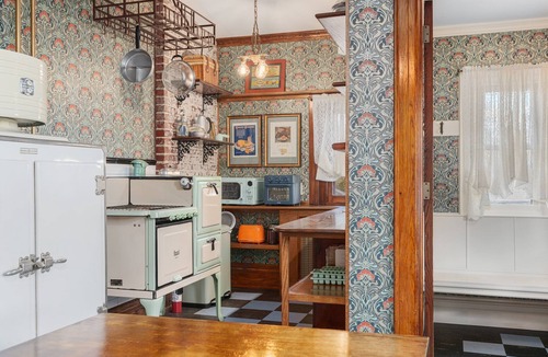 East Texas House | The Painted Petal: A Historic 5 Bedroom Mini Estate Perfect for Groups