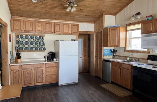 Niobe Cottage | This charming lake cottage located in a peaceful, safe community right on the lake!