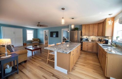 Milton Apartment | Town center, walk to popular amenities, short drive to local beaches.