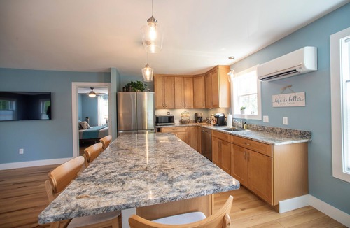 Milton Apartment | Town center, walk to popular amenities, short drive to local beaches.