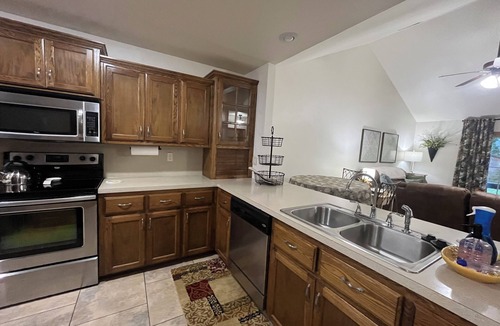 Spiro House | Upscale home with high end furnishings and memory foam king bed. 2 car garage
