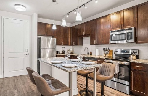 Central Business District Apartment | Virelli Apartments Upscale King Suite in the Heart of Orlando w Pool