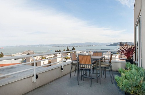 North Beach Condo | WATERFRONT PENTHOUSE. SPECTACULAR VIEWS, DECKS, PRIVACY, QUIET, PARKING, GYM.