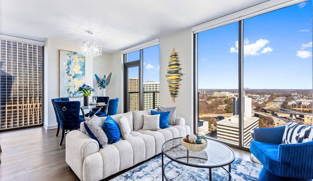 Azure Heights: 21st Floor Designer Condo | Walk to FIFA, Skyline Views