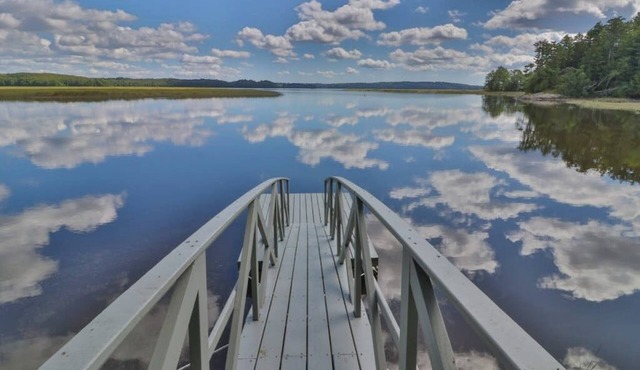Bayfront home with gorgeous water views, dock, outdoor patio, fireplace