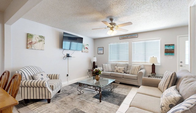 Beachfront townhome w/on-site beach access, heated pool, patio, grill, AC, W/D