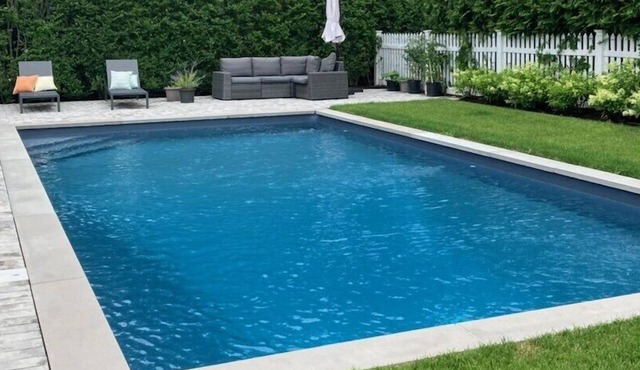 Beautiful Hampton Bays home with a private heated pool, minutes to Shinnecock