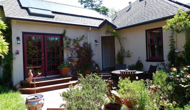 Bright, charming 4 BR Berkeley home, with beautiful patio and yard.