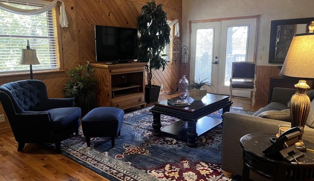 C18 - Lake view two bedroom, two bath loft, log-sided cottage with private hot tub overlooking Lake Ouachita