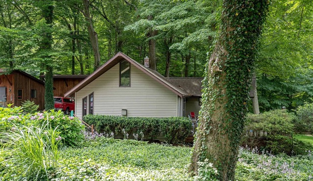 Charming Wooded Cottage with Lake Michigan Access!