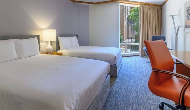 Comfortable Boutique Stay Near Dining and Entertainment