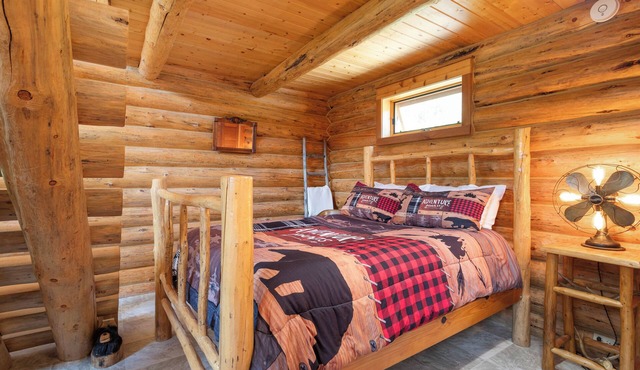 Creekside log cabin near Flathead Lake