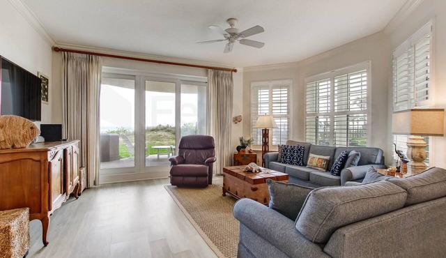 Ground floor unit in gated community. Tastefully decorated and located on southern end of Island.
