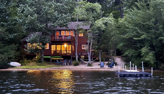 Lakeside home with private dock, firepit, grill, scenic balcony, fireplace & AC