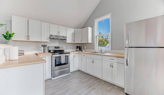 Picturesque Riverfront | 4 BD | Parking Provided