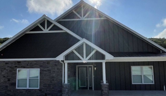PRIVATE POOL AND HOT TUB! In Town spacious 8 Bedroom and 8.5 Bathroom home.