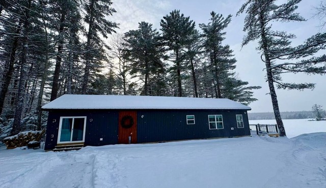 Snowmobiler & Ice Fishing Paradise right on the water with mountain views!