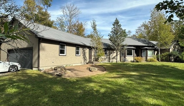 Sprawling Berkshires Ranch Nestled In A Private Wooded Lot With Expansive Yards!