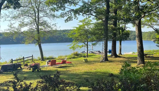 Spring fed Lake front home floating dock and boats
