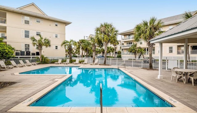 Sunny coastal condo with pool balcony & sound view - walk to the beach